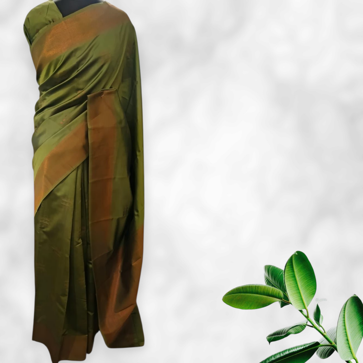 Nature’s Hue – Classic Soft Silk Saree in Leafy Green and Rust Gold